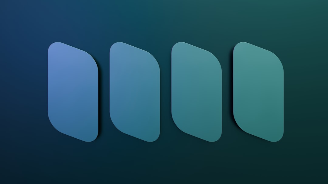 Four blue gradient shapes on a dark background.